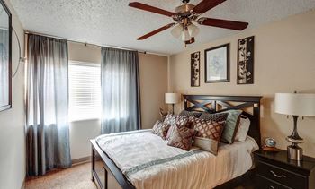 Bedroom with Ceiling Fan at University Village Apartments, Colorado, 80918